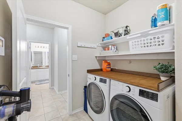 a view of washer and dryer in a utility room