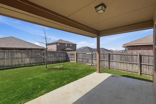a view of a backyard with a garden