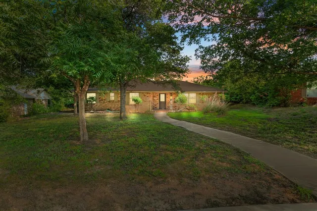 a view of outdoor space with deck and yard