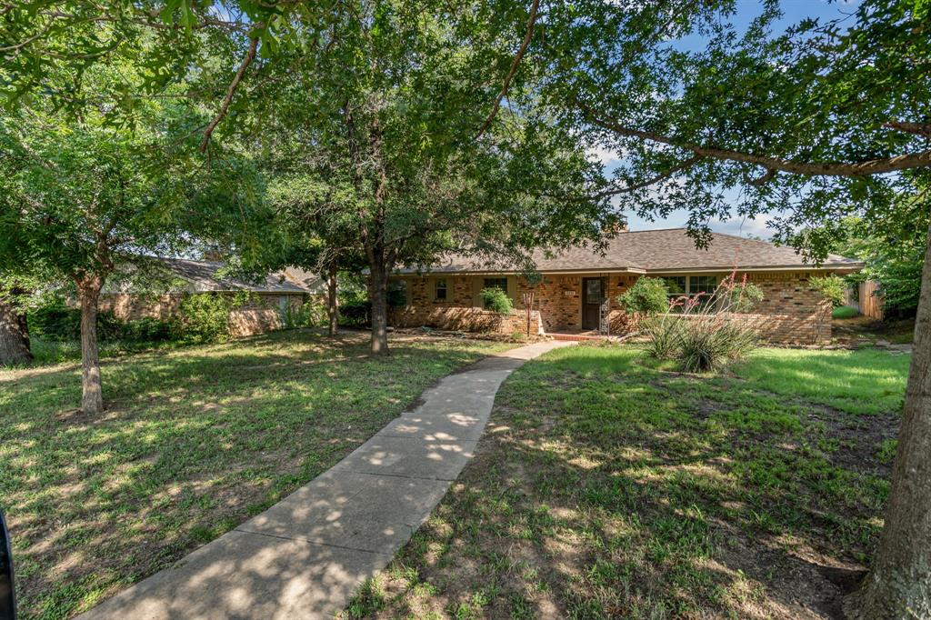 2216 Archer Trail Denton, TX 76209 - Photo 2 of 26 a view of a house with a yard