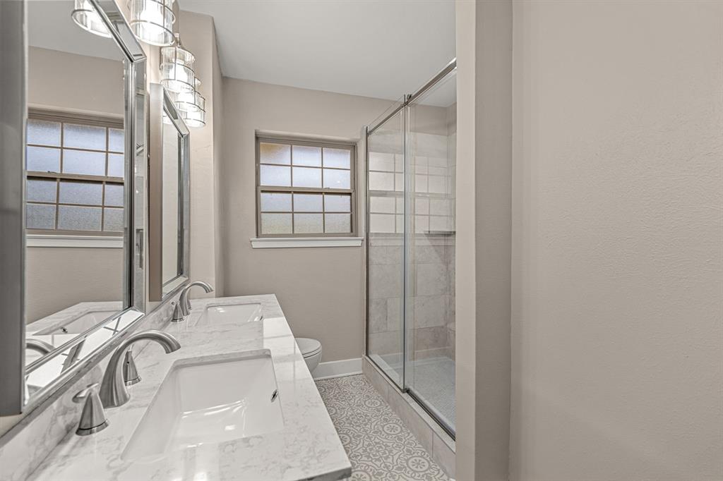 2216 Archer Trail Denton, TX 76209 - Photo 22 of 26 a bathroom with a sink and a mirror