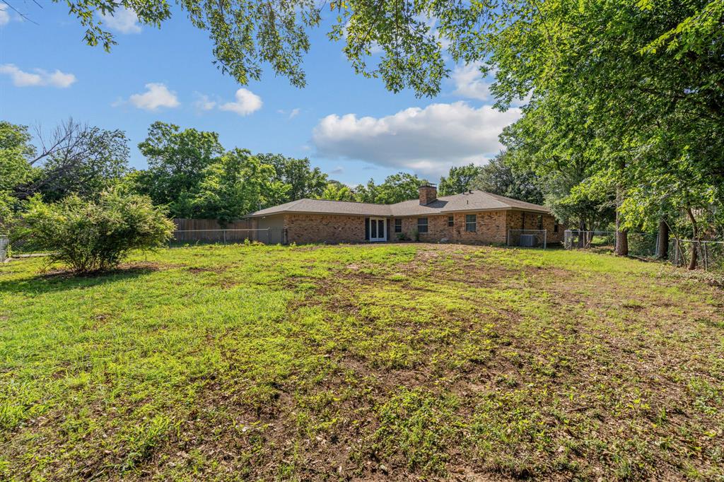 2216 Archer Trail Denton, TX 76209 - Photo 25 of 26 a view of a swimming pool with an outdoor space and seating area