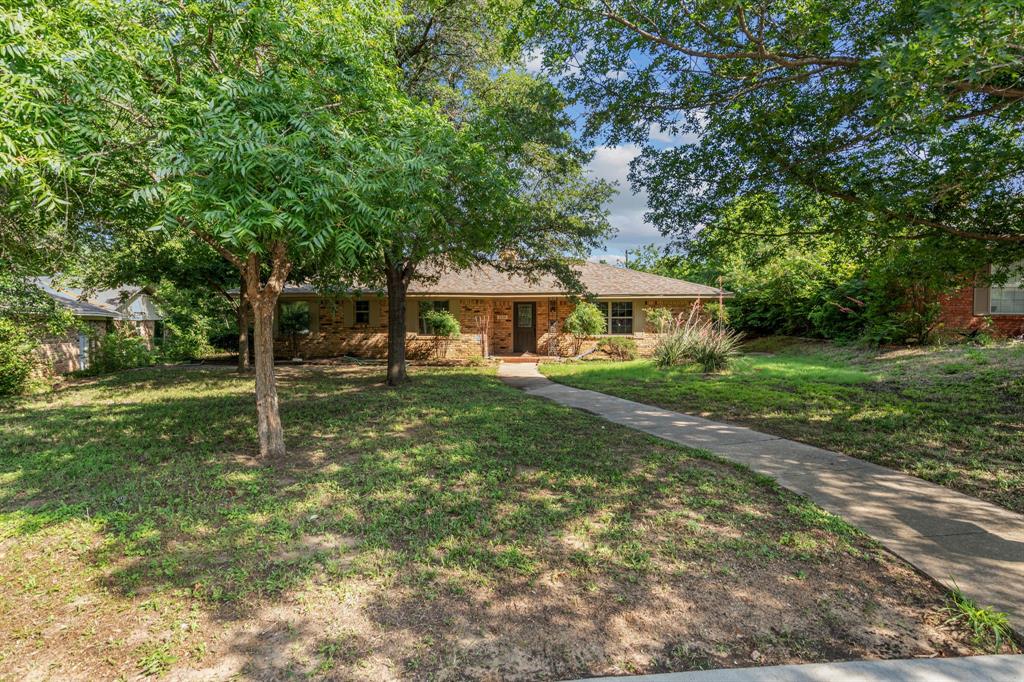 2216 Archer Trail Denton, TX 76209 - Photo 26 of 26 a view of a house with a yard porch and sitting area