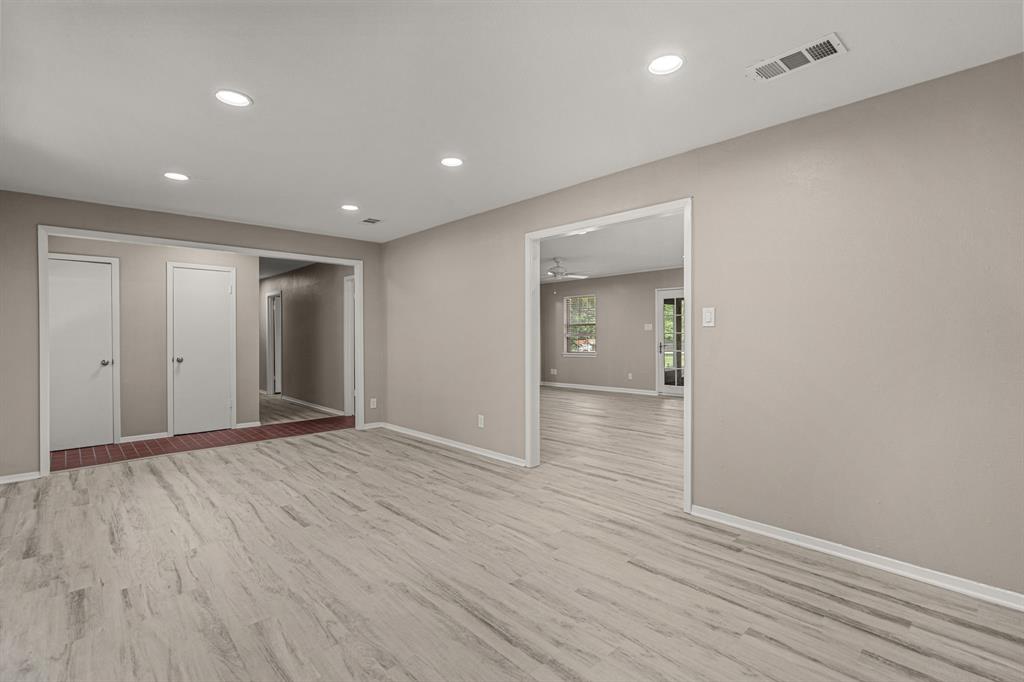 2216 Archer Trail Denton, TX 76209 - Photo 7 of 26 wooden floor in an empty room with wooden floor