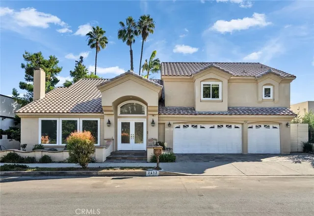 a front view of a house with a porch