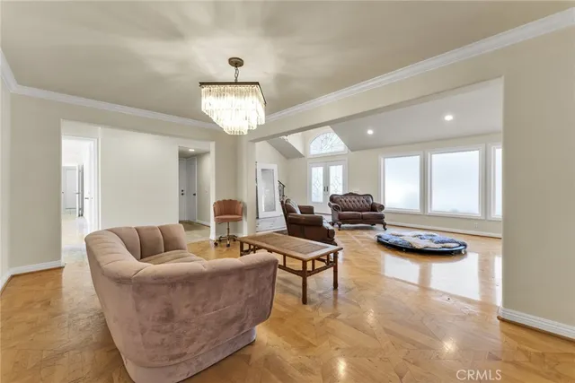 a view of a kitchen with a sink and refrigerator