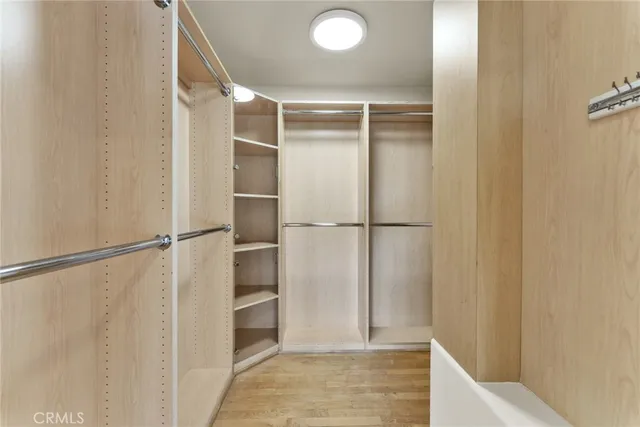 wooden floor in a room with a window