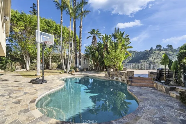 a view of a building with backyard