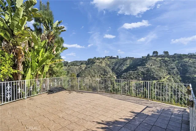 a balcony with an outdoor space