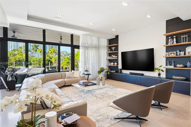 a view of a lobby with a potted plant and a potted plant