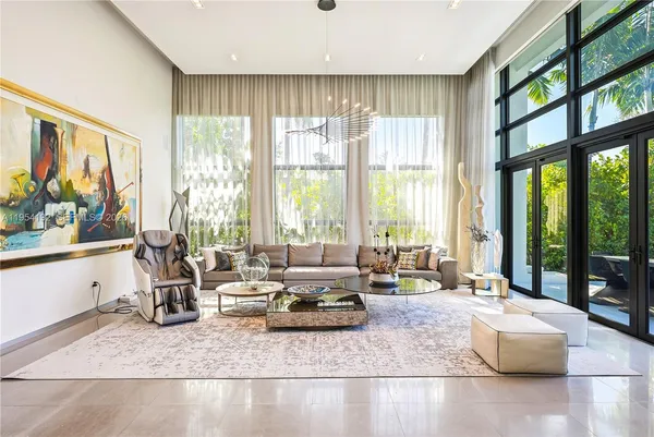 a wooden bench sitting in front of a building