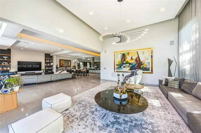 a swimming pool with chairs