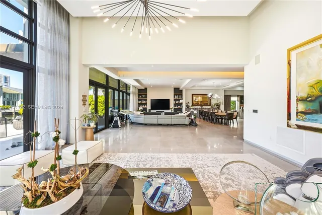 a spacious bedroom with a bed and a couch