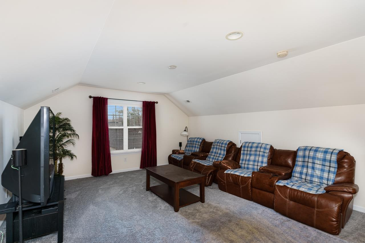 2206 Spacious Skies Street Raleigh, NC 27614 - Photo 29 of 30 3rth floor Rec Room or Man Cave including bathroom with new flooring!