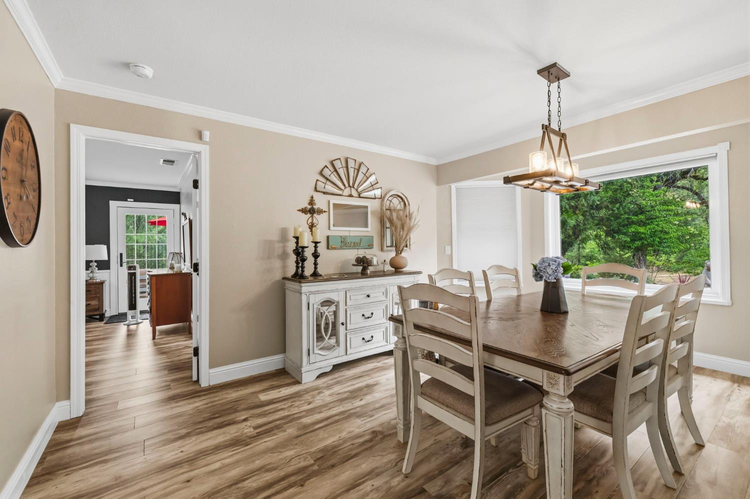 11460 Racetrack Road Sonora, CA 95370 - Photo 9 of 46 a view of a dining room with furniture window and wooden floor