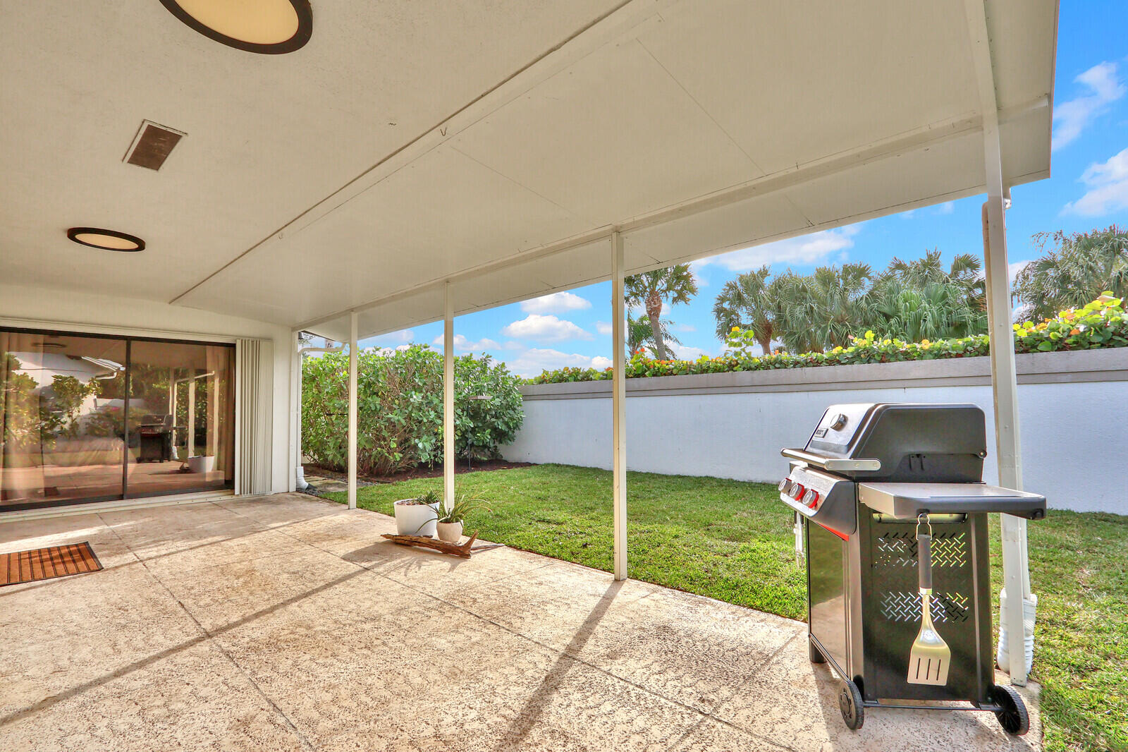 246 Ridge Road Jupiter, FL 33477 - Photo 26 of 39 a view of a room with wooden floor and outdoor space