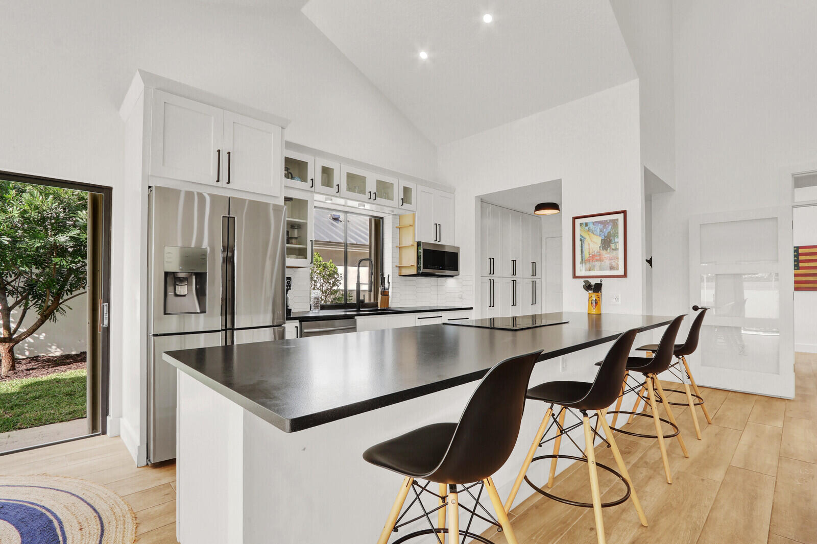246 Ridge Road Jupiter, FL 33477 - Photo 3 of 39 a dining room with furniture and window