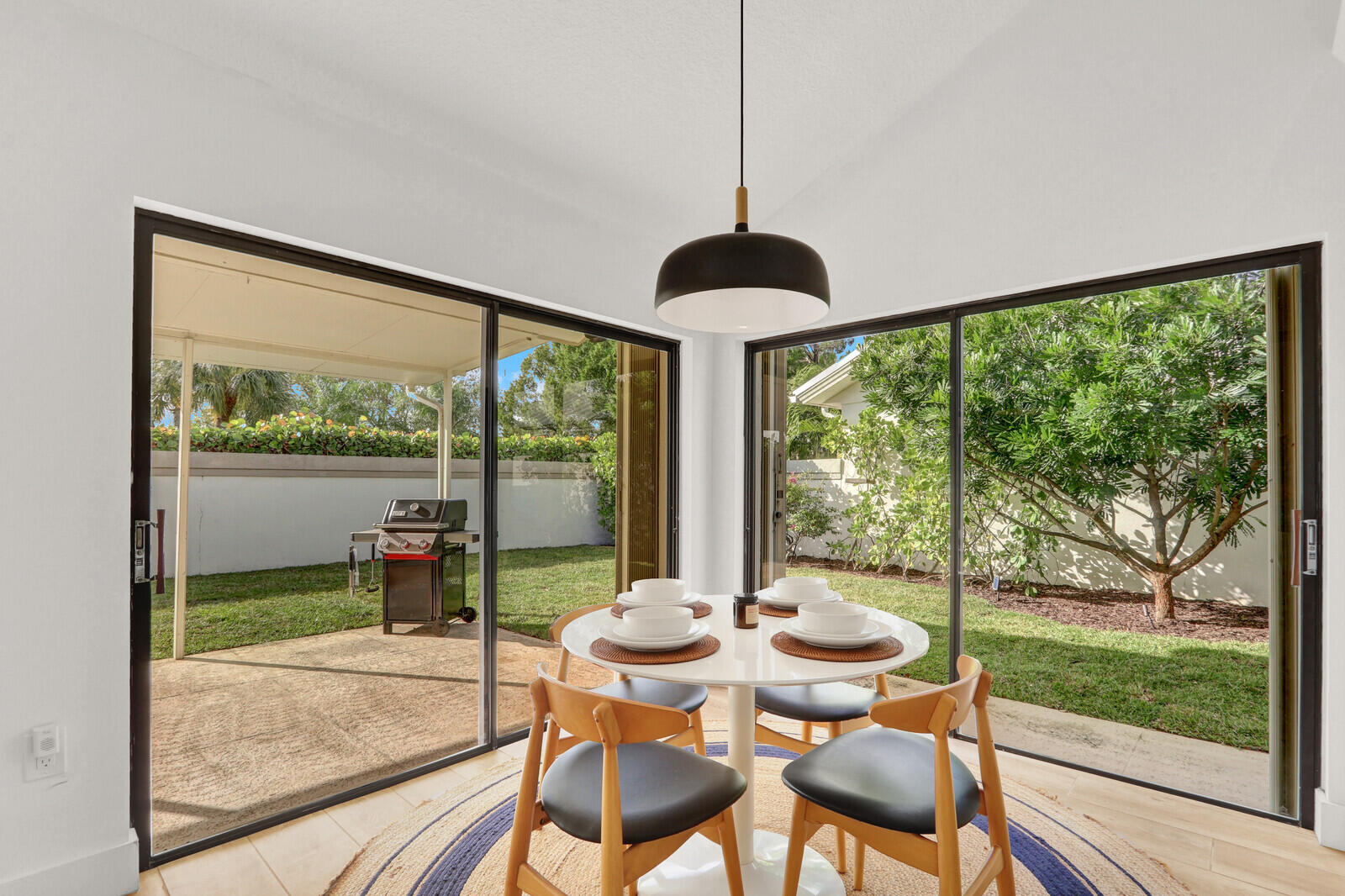246 Ridge Road Jupiter, FL 33477 - Photo 4 of 39 a view of a room with furniture and wooden floor