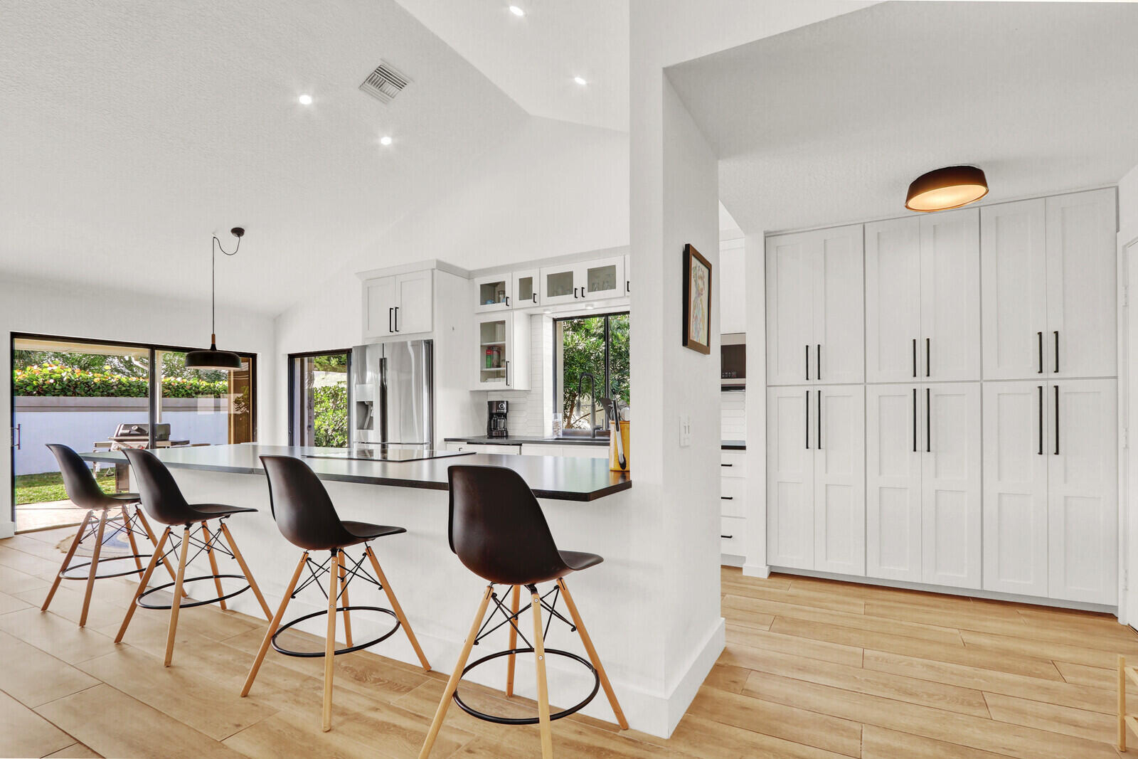 246 Ridge Road Jupiter, FL 33477 - Photo 7 of 39 a view of a kitchen with furniture and window