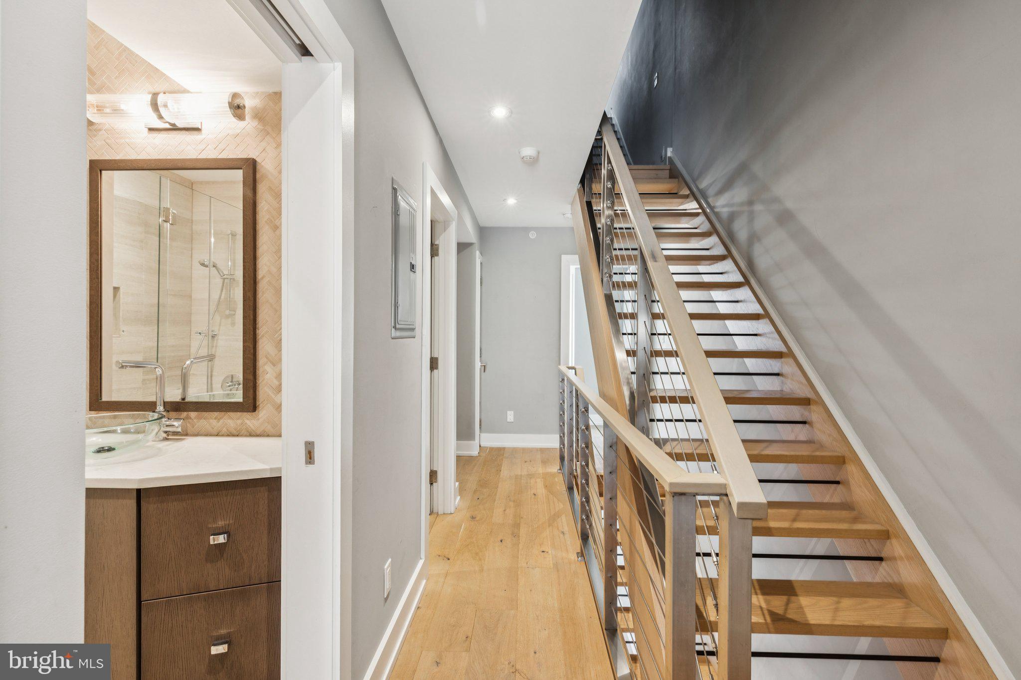 719 South 20th Street Philadelphia, PA 19146 - Photo 39 of 53 a view of a hallway with entryway and wooden floor