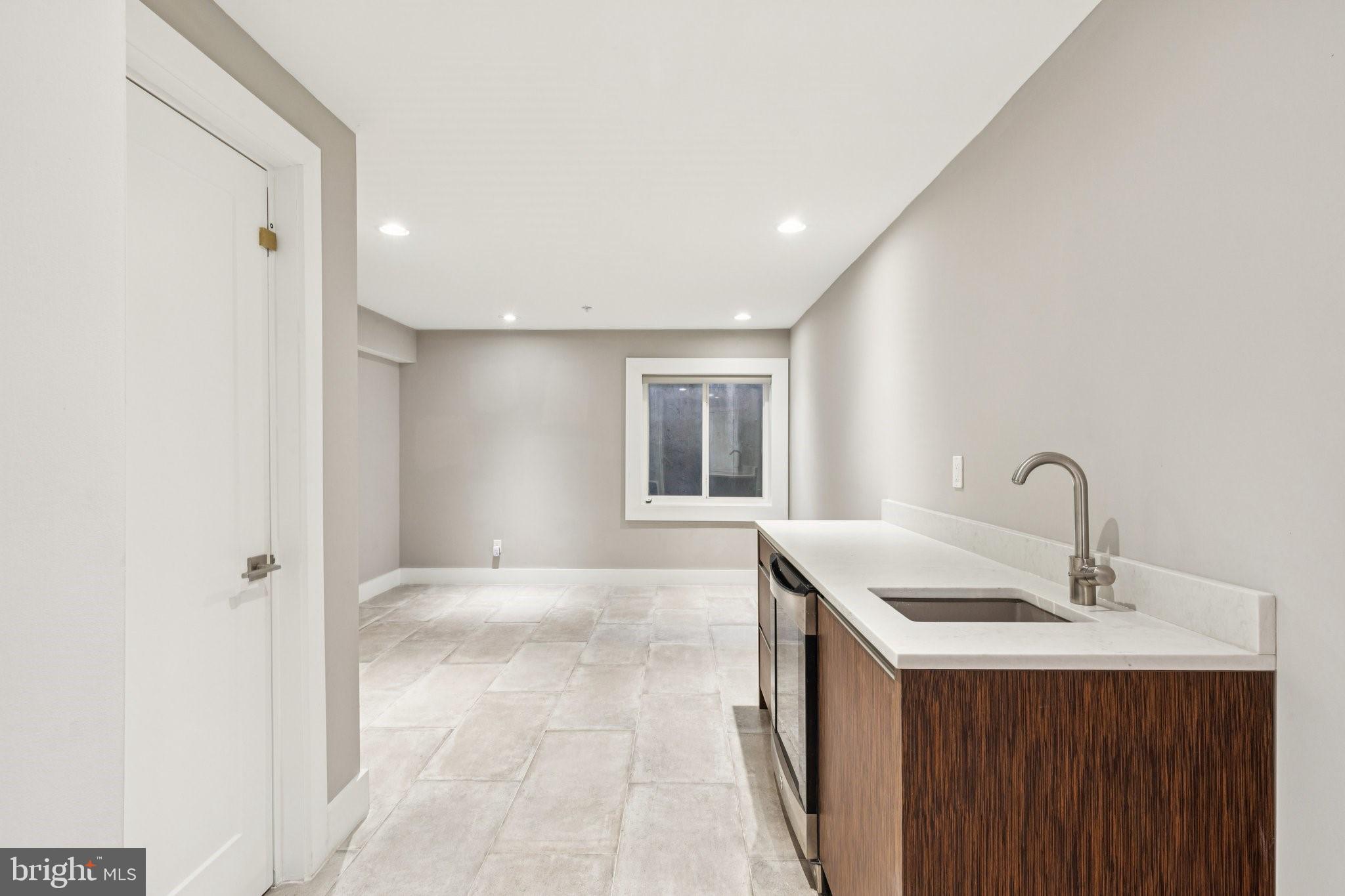 719 South 20th Street Philadelphia, PA 19146 - Photo 50 of 53 a bathroom with a sink and a mirror
