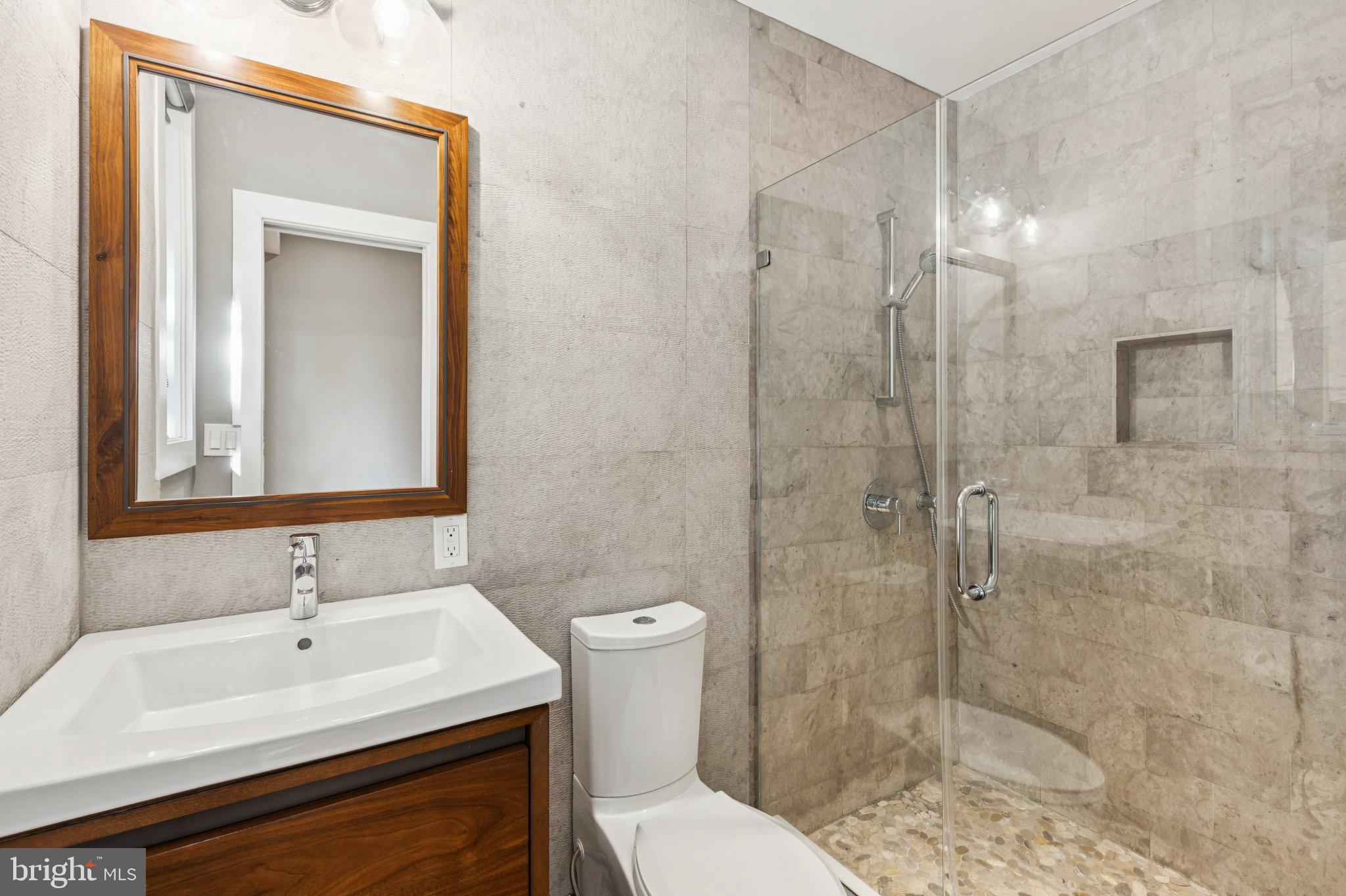 719 South 20th Street Philadelphia, PA 19146 - Photo 5 of 53 a bathroom with a sink toilet and shower