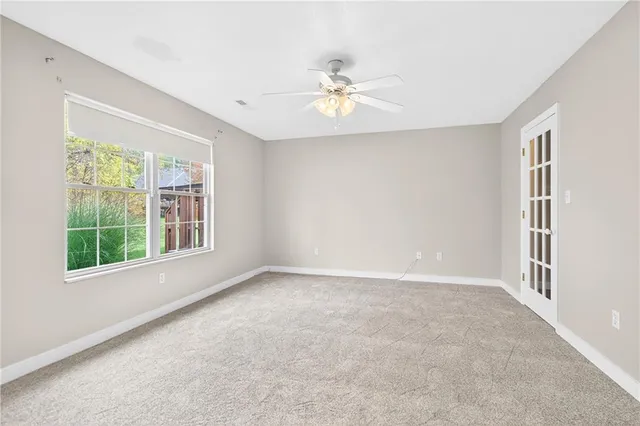 an empty room with windows