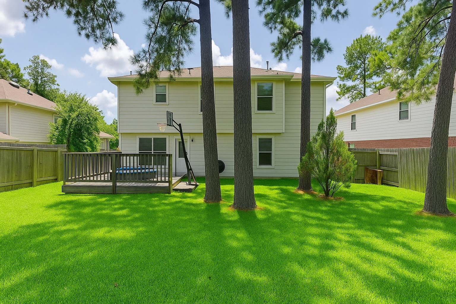 11606 Curry Ridge Lane Tomball, TX 77377 - Photo 27 of 28 The home boasts a large backyard with plenty of space for outdoor activities, entertaining, or adding a pool or garden.