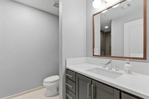 a bathroom with a sink and a toilet