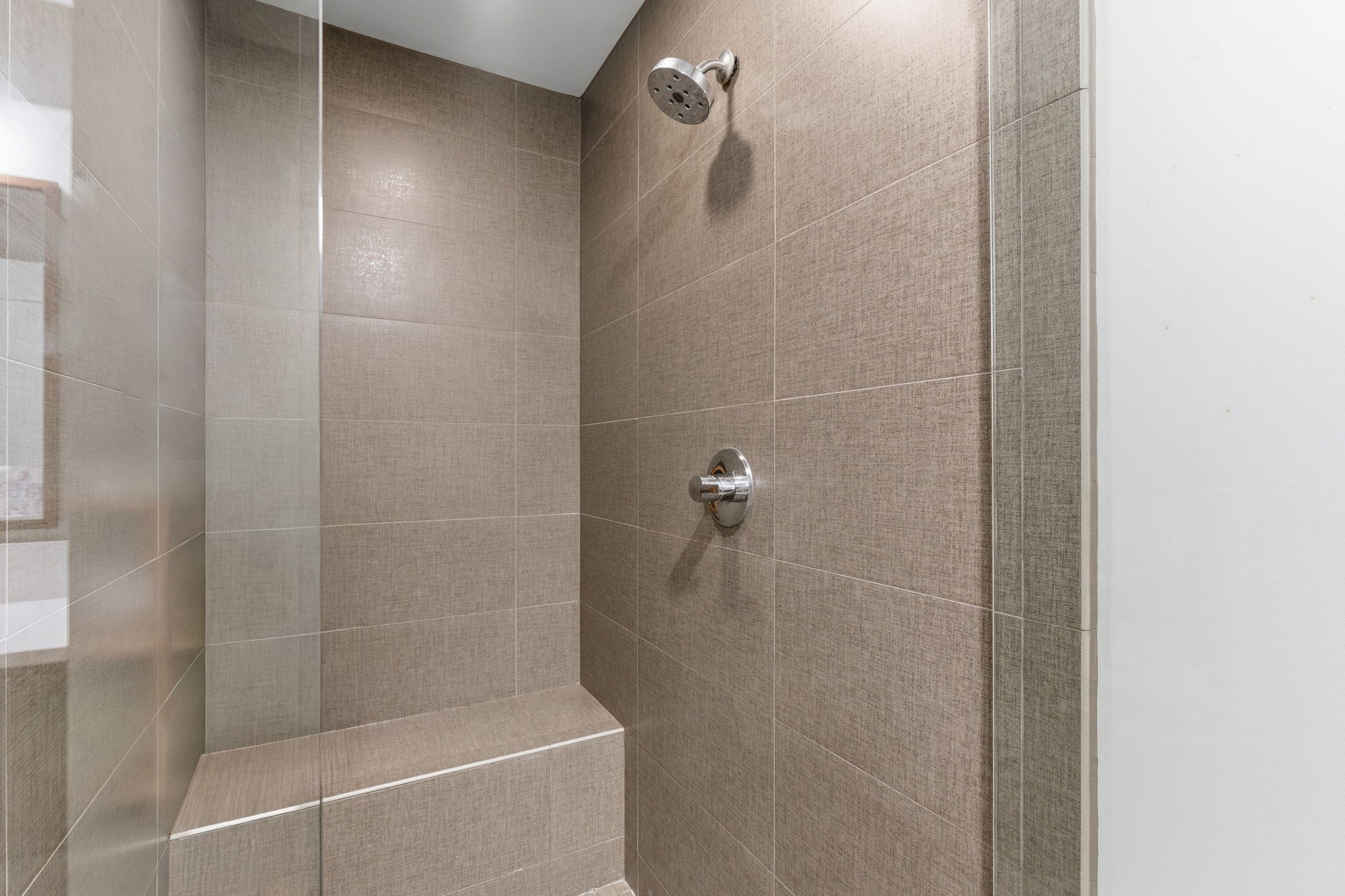 1212 Laurel Street, Unit 2010 Nashville, TN 37203 - Photo 9 of 11 a bathroom with a shower