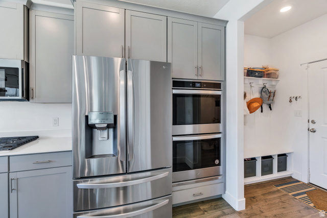 646 South Meade Street Mapleton, UT 84664 - Photo 5 of 46 Stainless steel French door refrigerator alongside double wall ovens