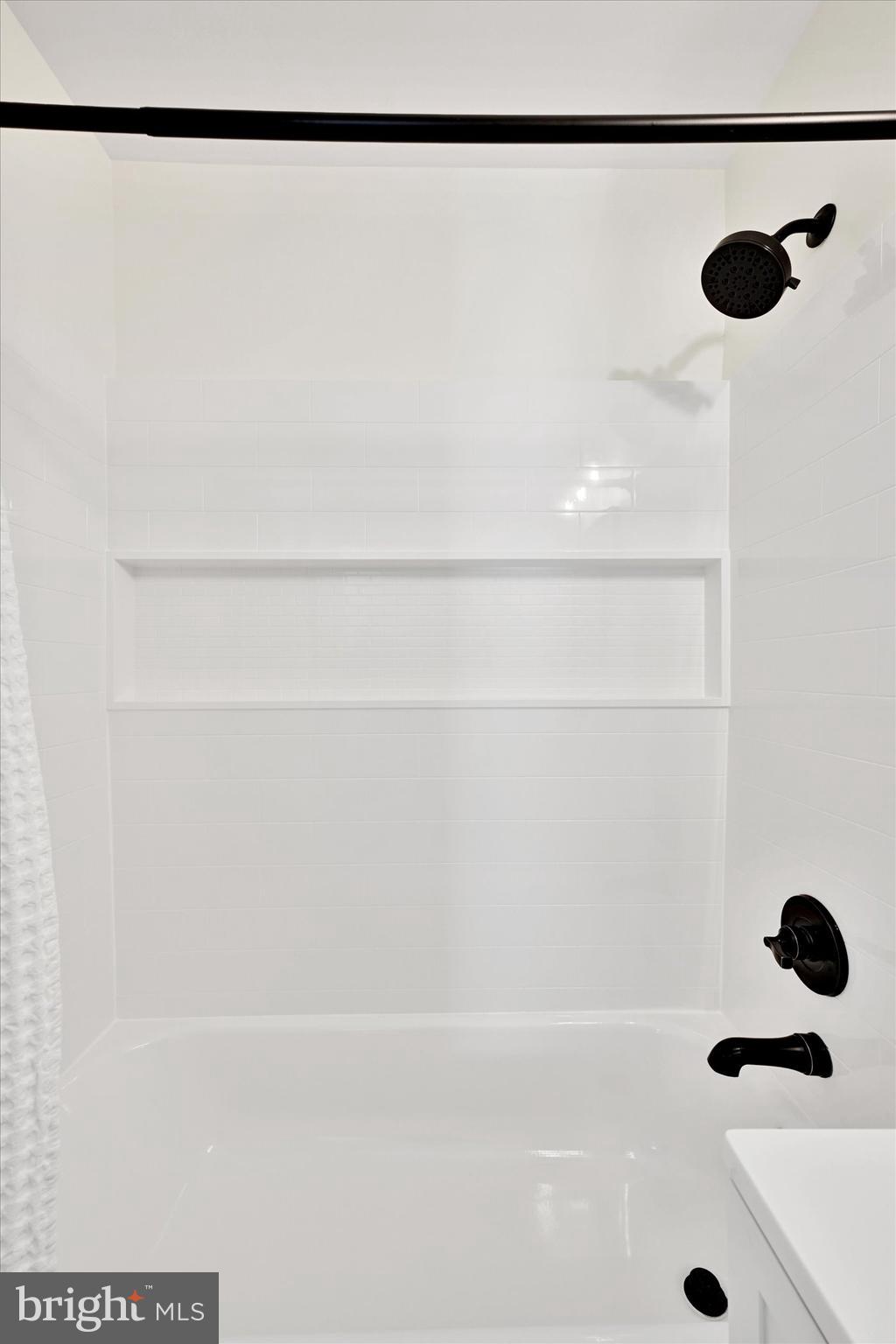 3 Edgemoor Road Lutherville-Timonium, MD 21093 - Photo 19 of 24 New tub/shower combo w/wall-to-wall niche.