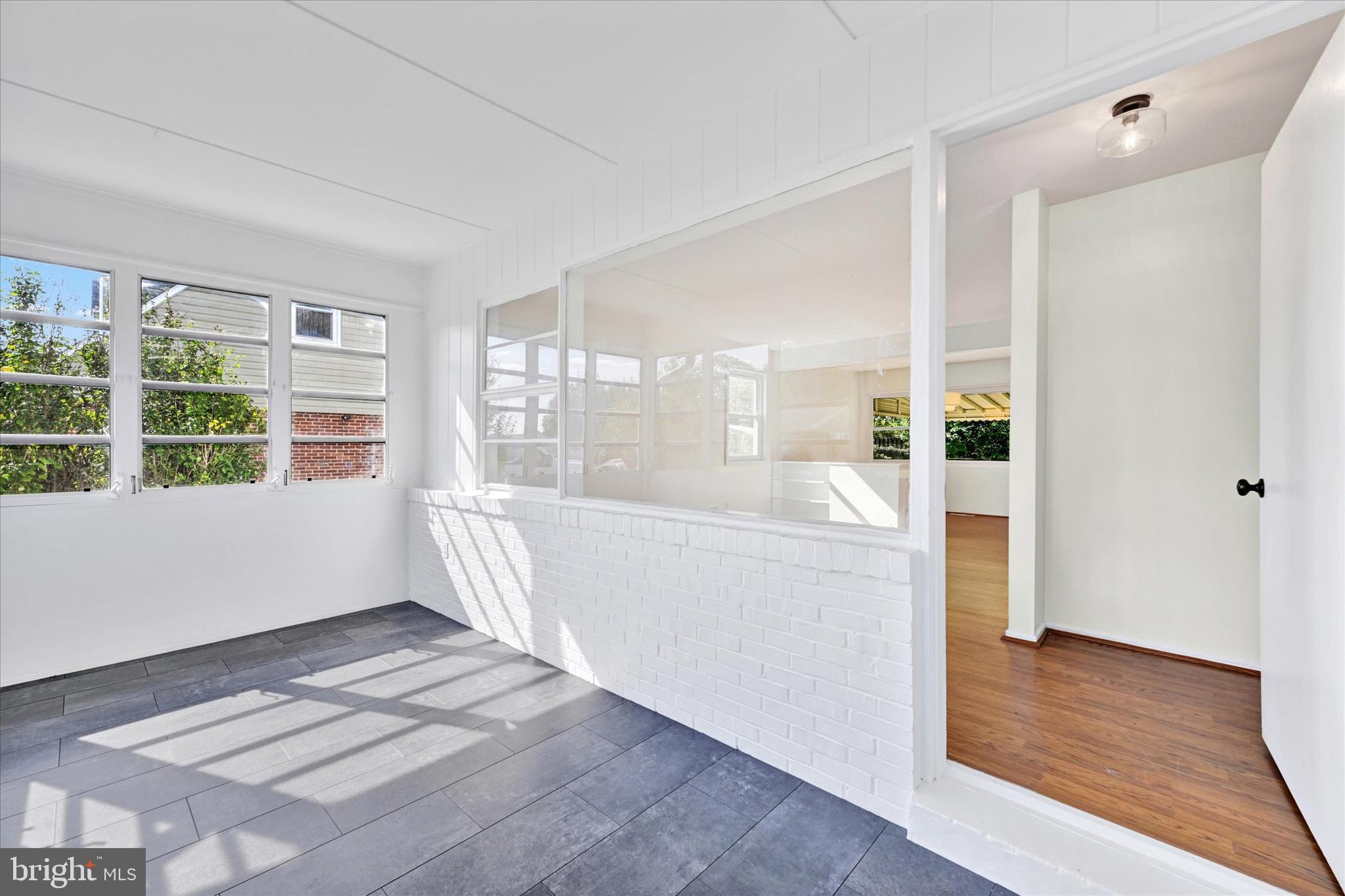 3 Edgemoor Road Lutherville-Timonium, MD 21093 - Photo 2 of 24 The light-filled sunroom welcomes you home.