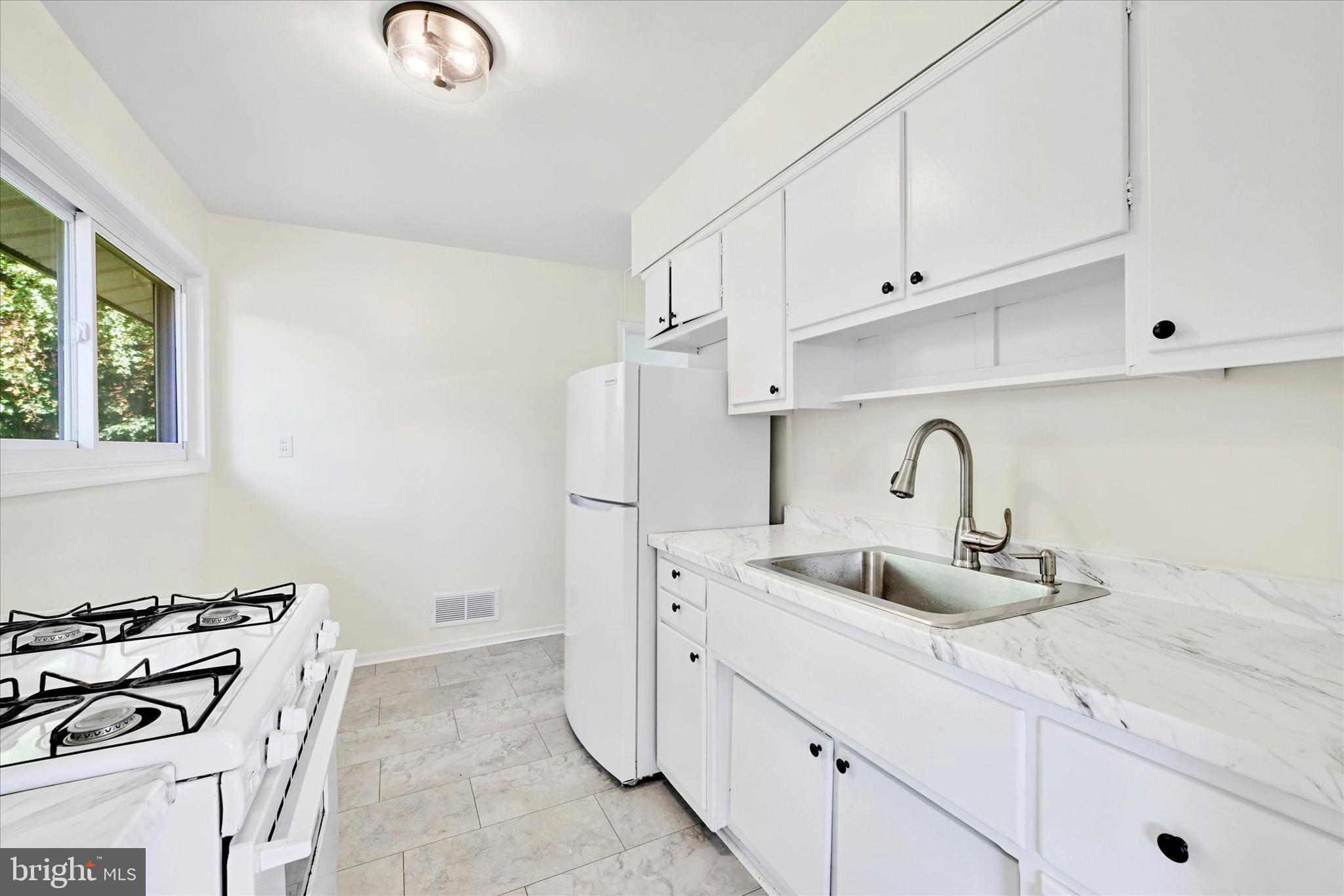 3 Edgemoor Road Lutherville-Timonium, MD 21093 - Photo 7 of 24 The kitchen is compact but functional...