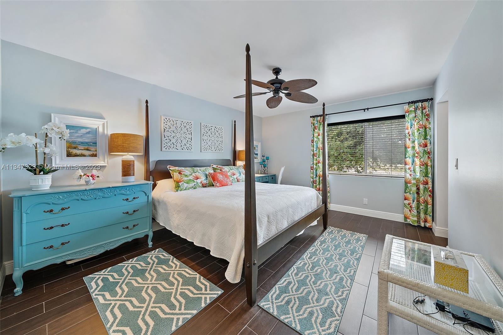 301 Pine Ridge Circle, Unit D2 Greenacres, FL 33463 - Photo 21 of 38 a bedroom with a bed and a window