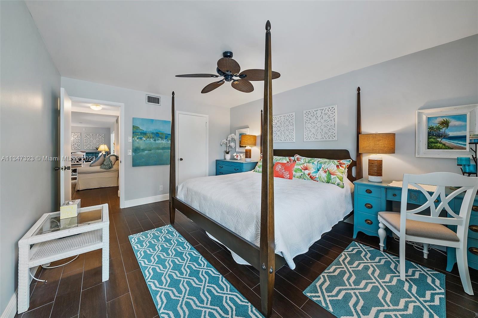 301 Pine Ridge Circle, Unit D2 Greenacres, FL 33463 - Photo 23 of 38 a bed room with a bed window and a table