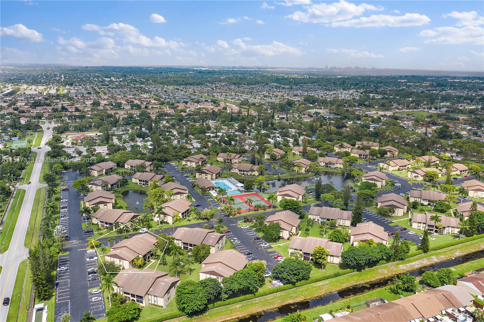 301 Pine Ridge Circle, Unit D2 Greenacres, FL 33463 - Photo 31 of 38 an aerial view of residential houses with outdoor space