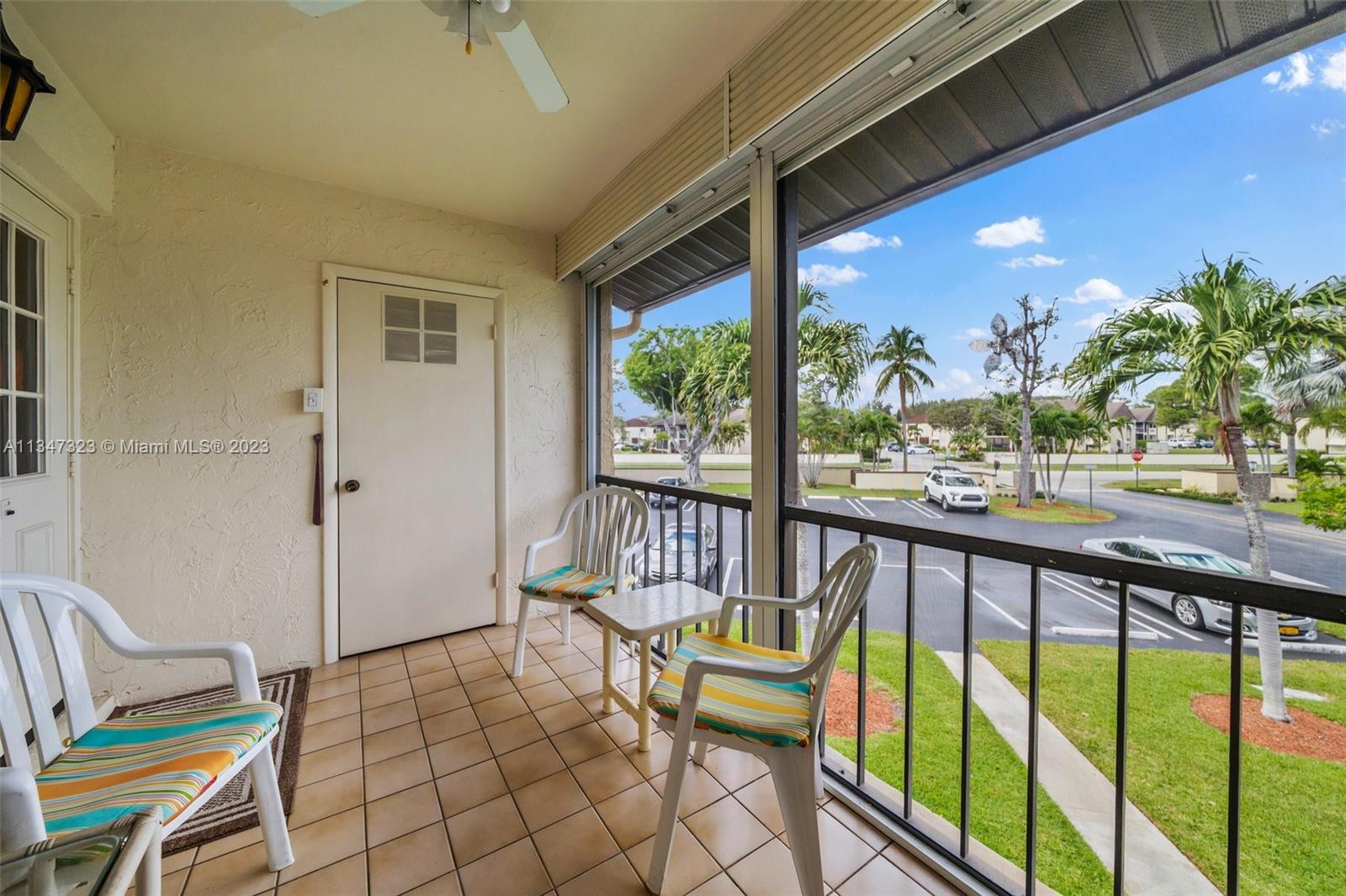 301 Pine Ridge Circle, Unit D2 Greenacres, FL 33463 - Photo 4 of 38 a view of a balcony with furniture