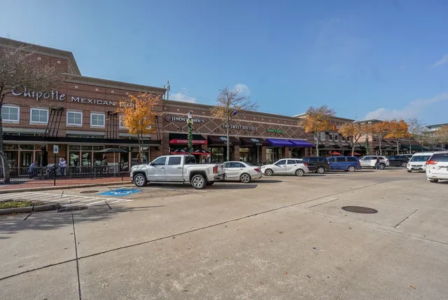 a car parked in front of a building