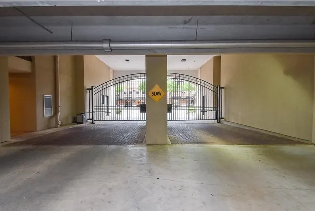 a front view of a residential apartment building with a yard