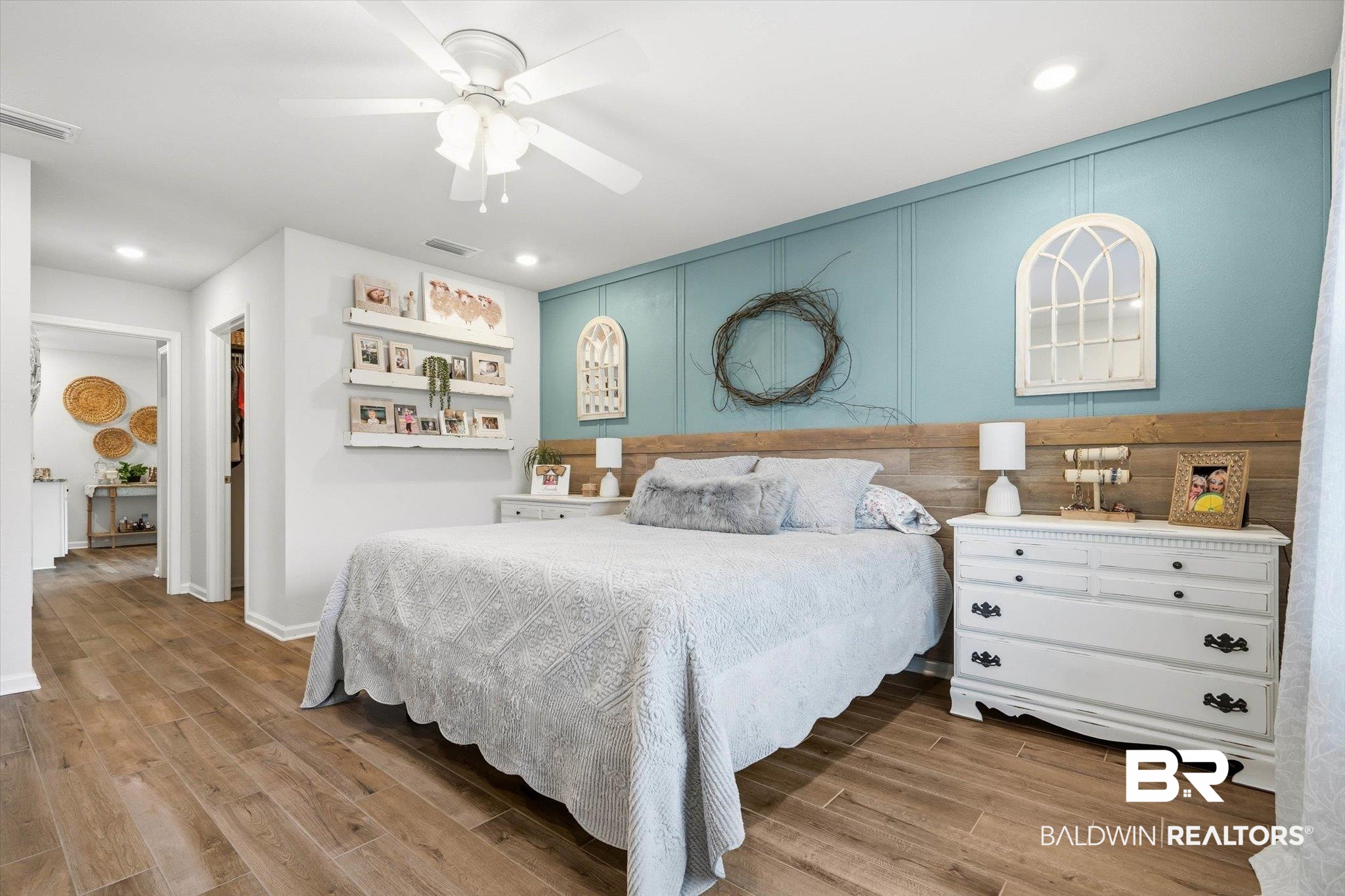 17041 Muse Street Loxley, AL 36551 - Photo 11 of 44 Bedroom with light wood-type flooring, ceiling fan, recessed lighting, and a spacious closet