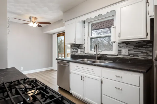 a view of an empty room with stairs