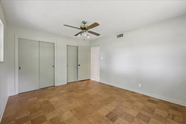 a view of a big room with carpet