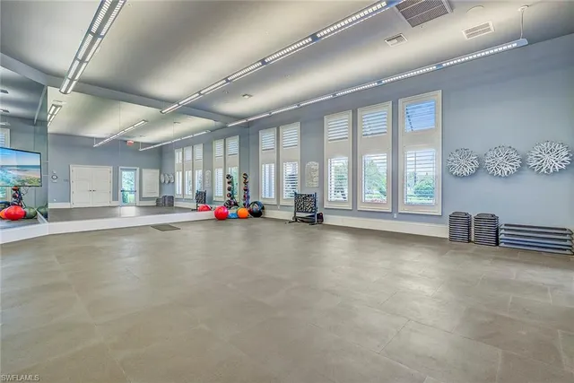 a view of water heater room with gym equipment