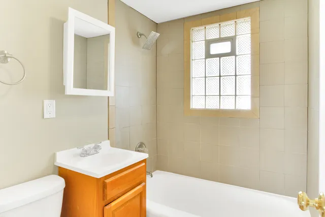 a bathroom with a sink and a bathtub