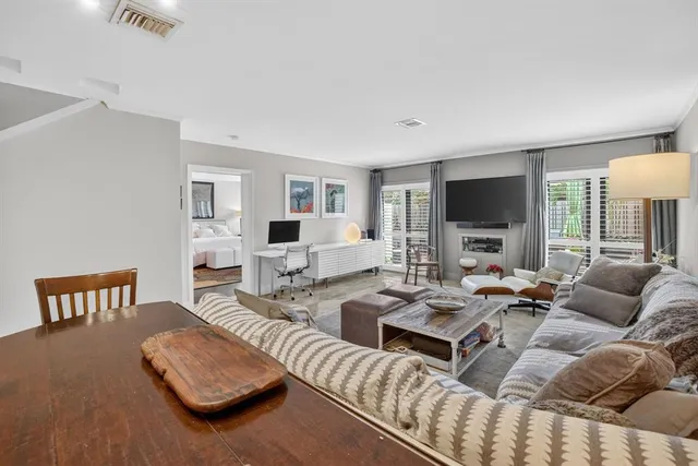 a kitchen with granite countertop a stove and a microwave