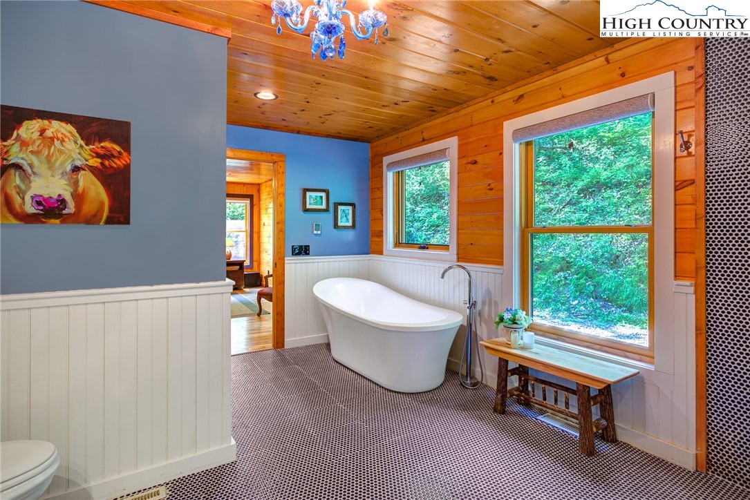568 Auborn Trivette Road Sugar Grove, NC 28679 - Photo 16 of 29 a living room with furniture and a large window