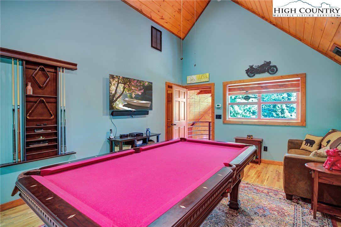 568 Auborn Trivette Road Sugar Grove, NC 28679 - Photo 18 of 29 a room with furniture pool table and windows