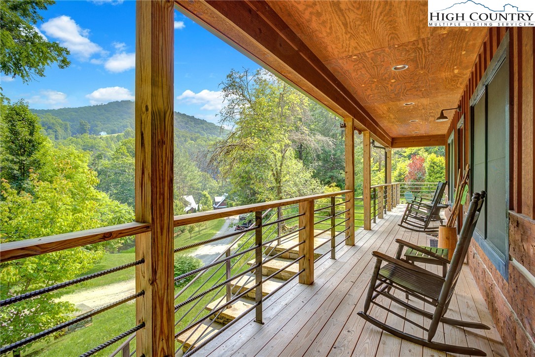 568 Auborn Trivette Road Sugar Grove, NC 28679 - Photo 2 of 29 a view of balcony with wooden floor