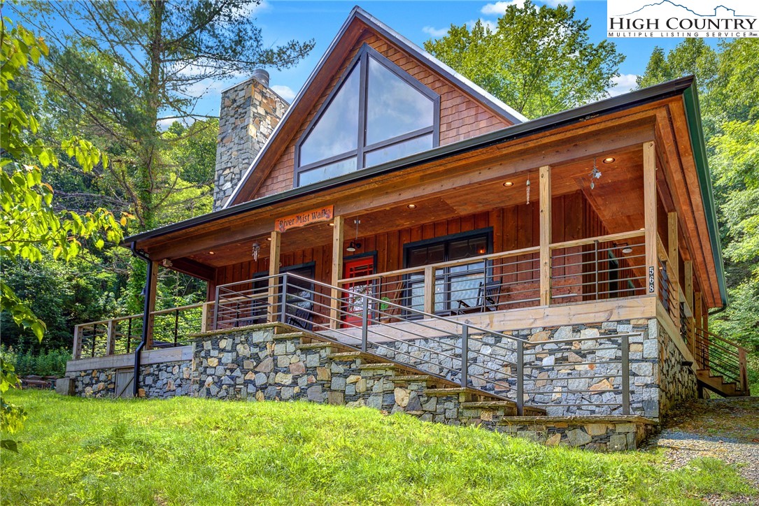 568 Auborn Trivette Road Sugar Grove, NC 28679 - Photo 4 of 29 front view of a house with a yard